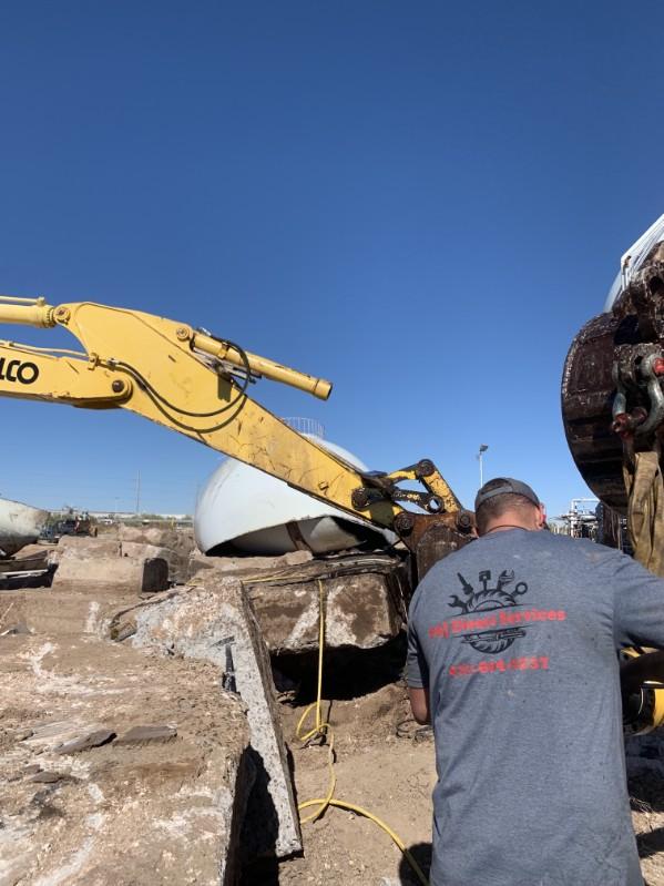 Hydraulic repair on excavator